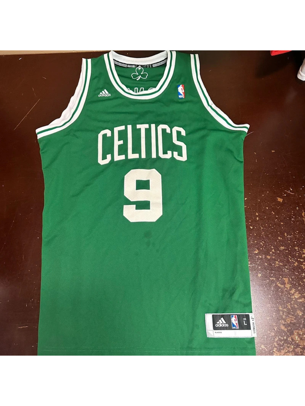 Boston Celtics green Adidas men’s Rondo basketball jersey large